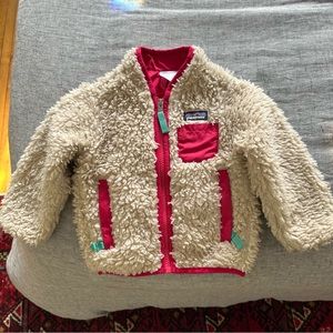 Baby Patagonia Sherpa Retro-X Fleece jacket with pink detailing